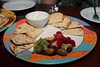 Brendan Gray (budcub) > assorted pita bread, olives, and tzatziki dipping sauce